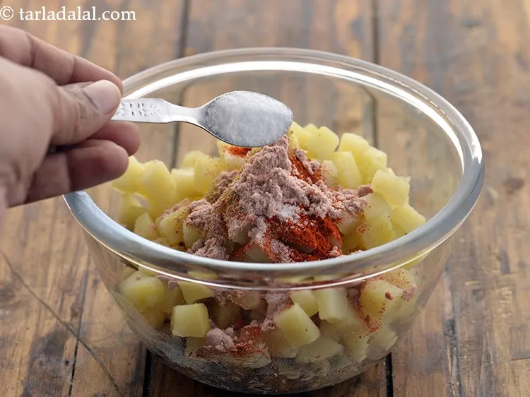 Step 25 – Finally, some black salt (sanchal) and salt to taste.