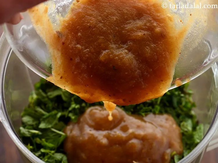 Step 20 – Add <a href="https://www.tarladalal.com/Tamarind-Pulp-Imli-Pulp-32648r" target="_blank">tamarind pulp</a> to a blender.