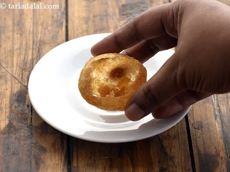 Step 29 – For preparing&nbsp;<strong>Mumbai roadside pani puri | homemade pani puri | puchka | |&nbsp;homemade golgappa |</strong>&nbsp;crack …