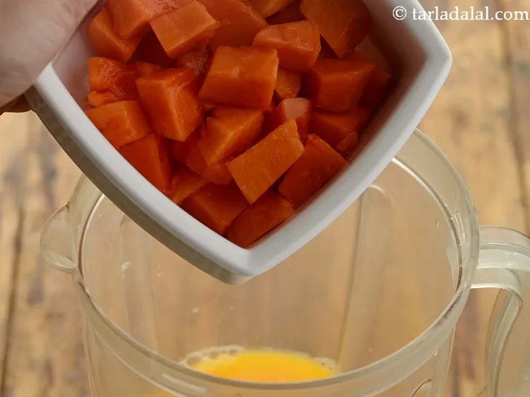 Step 9 – To this add roughly chopped papaya.