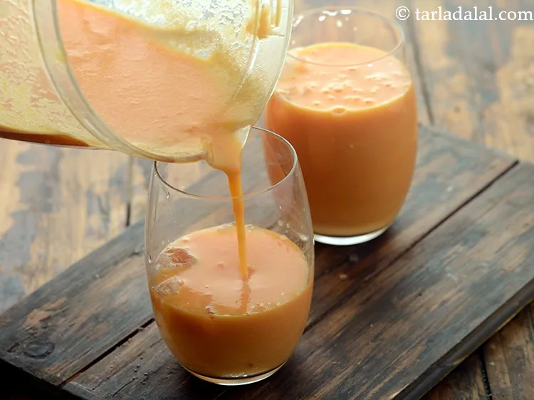 Step 14 – Pour the <strong>papaya orange drink </strong>over it.&nbsp;