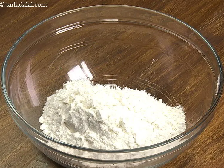 Step 13 – For preparing the Papdi dough, in a deep bowl take maida. You can even take …