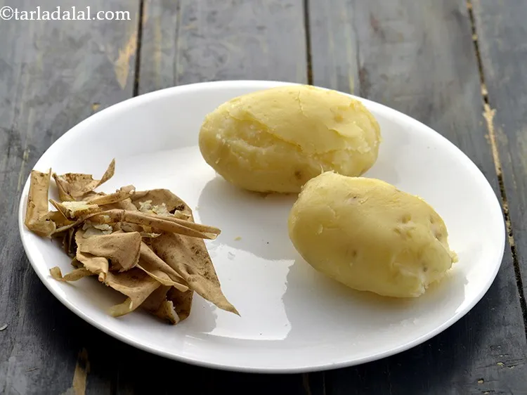 Step 9 – Cool slightly, remove the skin and discard it.