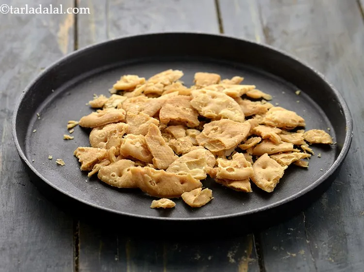 Step 14 – Arrange the crushed papdi on a serving plate.