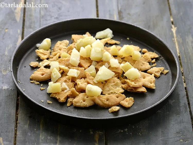 Step 15 – Top it with &frac14; cup potatoes.