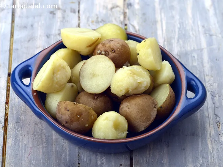 Step 28 – Add 1 1/4 cups&nbsp;<a href="https://www.tarladalal.com/glossary-boiled-baby-potato-halves-2643i">boiled baby potatoes halves</a>&nbsp;(unpeeled).