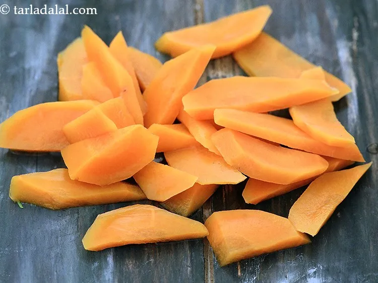 Step 28 – We also need 1/2 cup diagonally cut and boiled carrots.&nbsp;