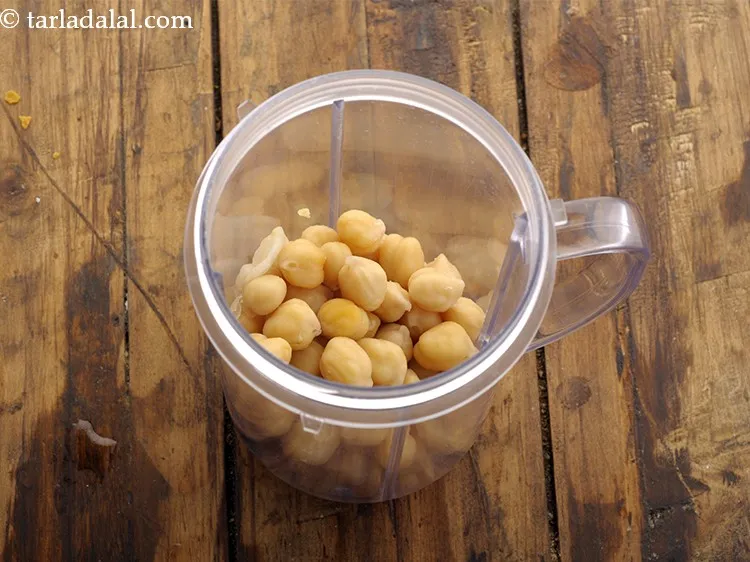 Step 9 – Let the chickpeas cool completely and then put them in a mixer jar