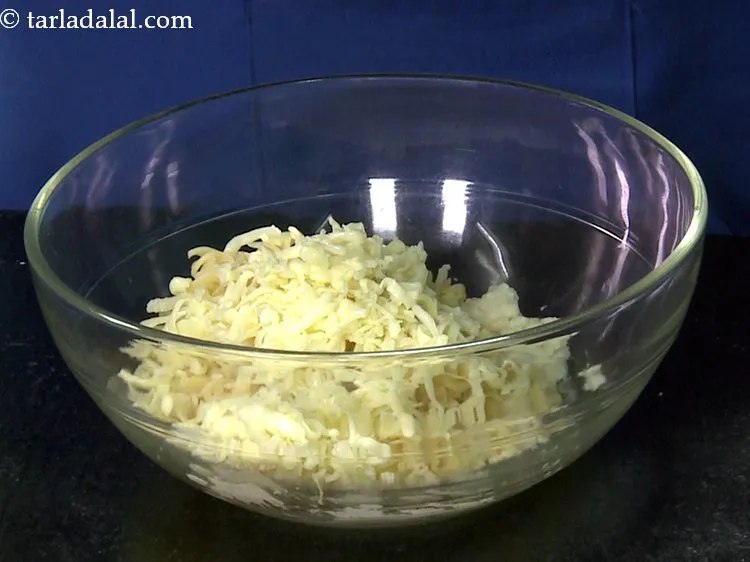 Step 11 – Add loads of processed cheese.