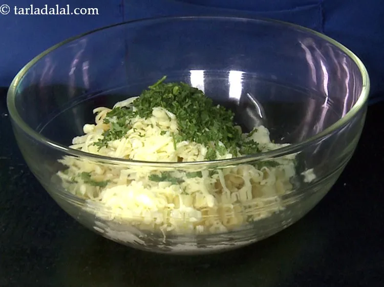 Step 12 – Add chopped coriander to get the perfect Indian starter flavour.&nbsp;