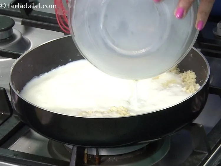 Step 5 – Add the milk for <strong>pasta balls Indian starter</strong>.&nbsp;
