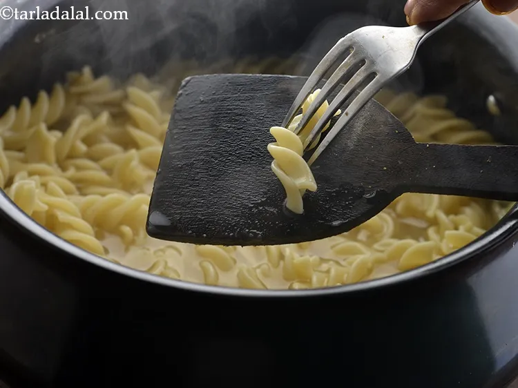 Step 6 – After 5 to 7 minutes, remove one pasta out of the water and keep it …