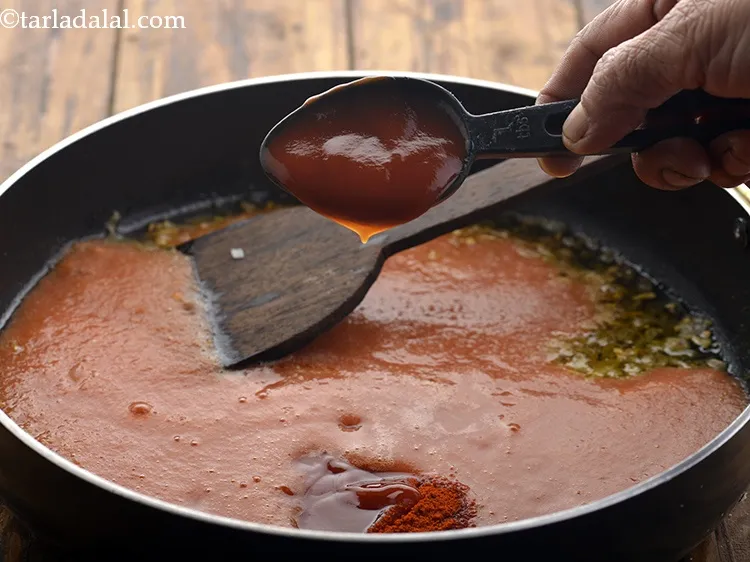 Step 25 – Also, add the tomato ketchup. It provides a beautiful tangy flavour to the <strong>red sauce …