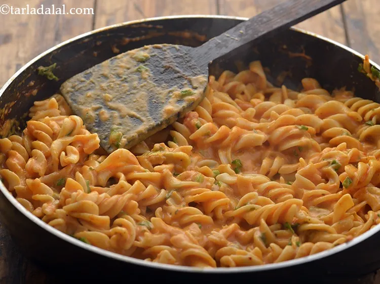 Step 32 – Mix gently and cook on a medium flame for 1 minute &amp; our&nbsp;<strong>Pasta In Tomato …