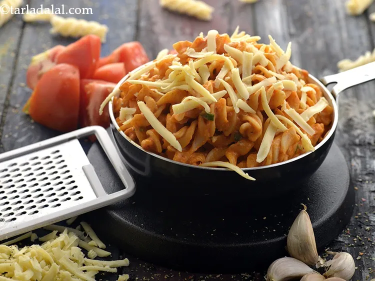 Step 33 – If you wish to pack the&nbsp;<strong>Pasta In Tomato Sauce</strong>&nbsp;for lunch, cool them slightly and pack …