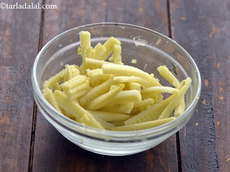 Step 16 – Similarly, transfer the baby corn in another bowl, add water. If you have sweet corn …