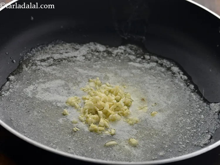 Step 21 – Add garlic and saut&eacute; on a medium flame for a few seconds. To make <strong>Jain …