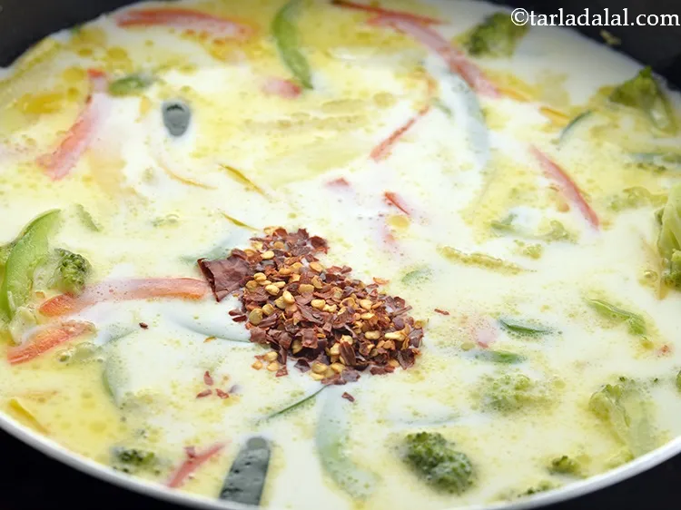 Step 30 – Add the chilli flakes. The quantity can be adjusted as per your liking.