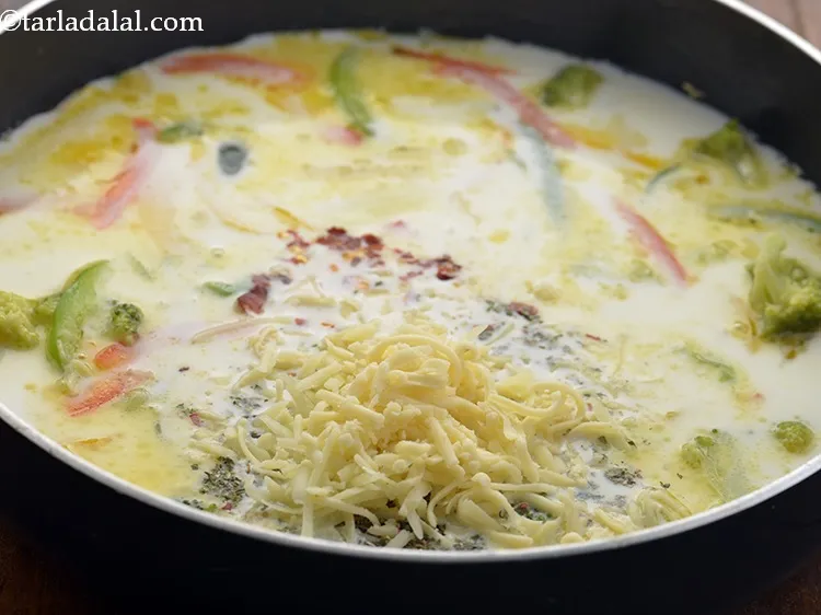 Step 32 – Add the cheese. Processed cheese can be substituted with cheese slice or cheddar cheese, parmesan …