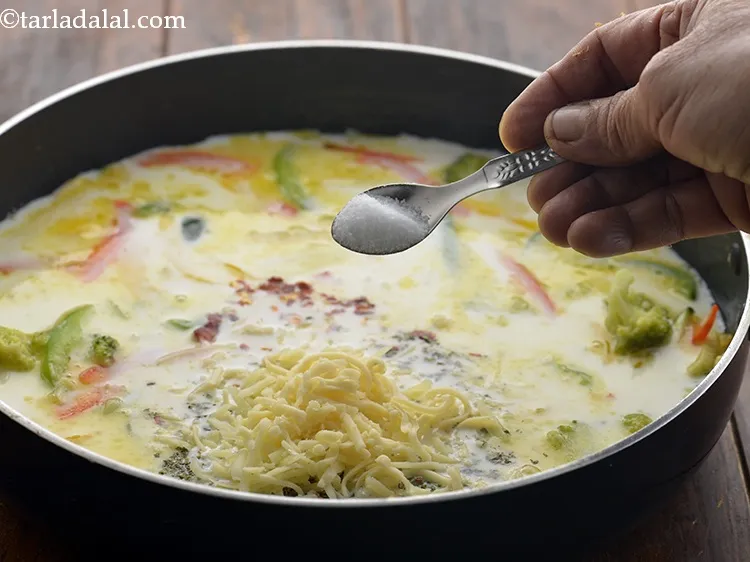 Step 33 – Add little salt, mix well and cook on a medium flame for 2 minutes, while …