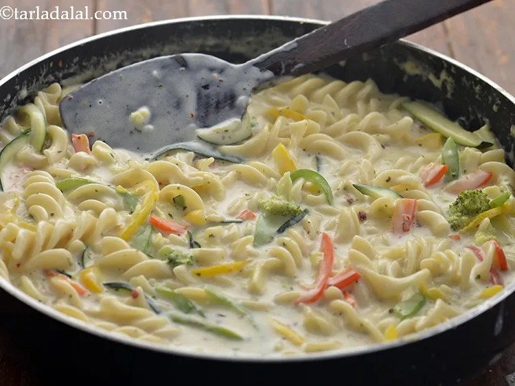 Step 35 – Mix gently and cook&nbsp;<strong>white sauce pasta | Indian style&nbsp;white sauce pasta |&nbsp;pasta in white sauce …