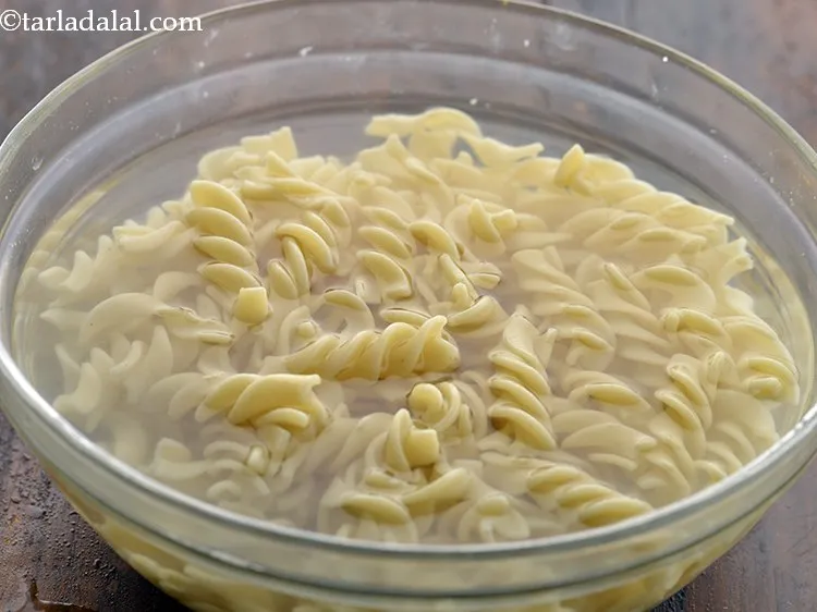 Step 11 – Transfer to a bowl of cold water or refresh under running water to prevent over …