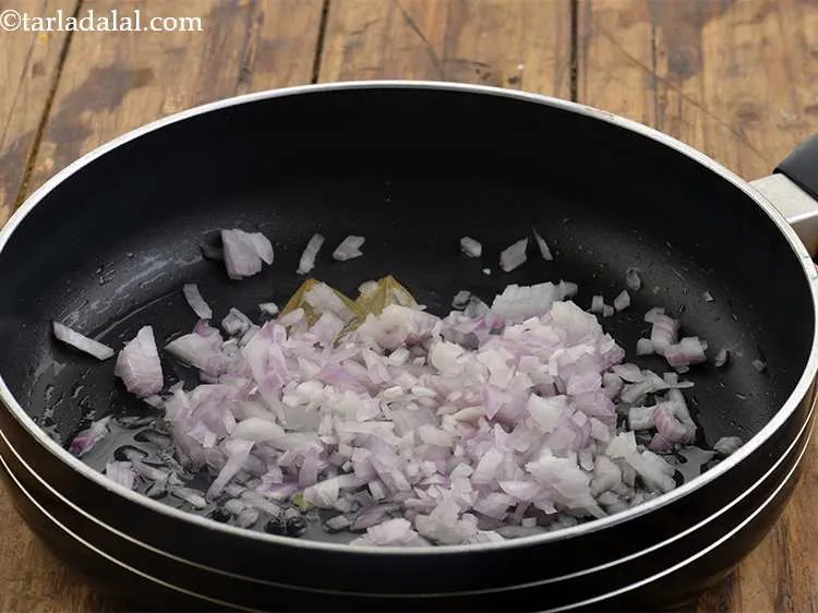 Step 25 – Then add the onions.