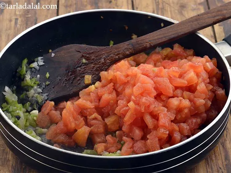 Step 30 – Add the blanched and chopped tomatoes.