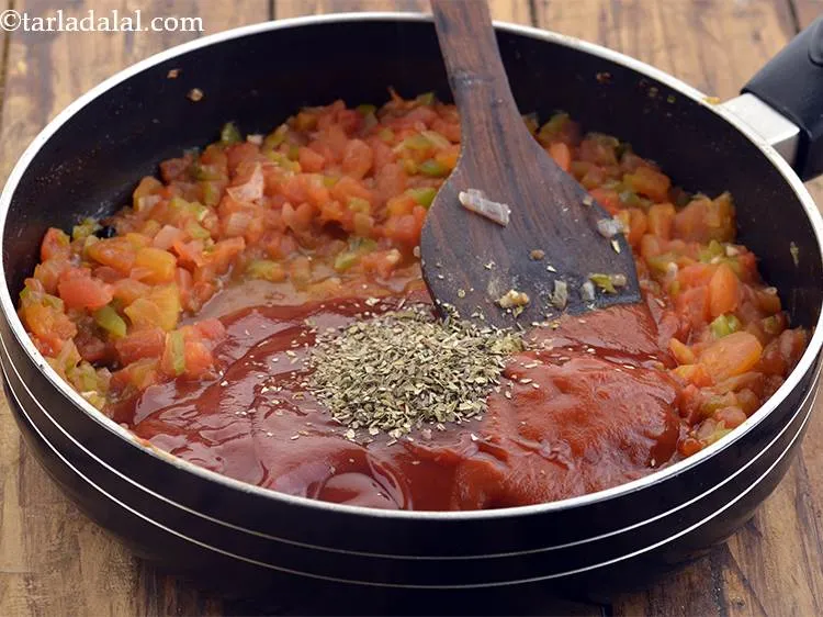 Step 35 – Furthermore, add the oregano. We have used the dried variant but you can use fresh …