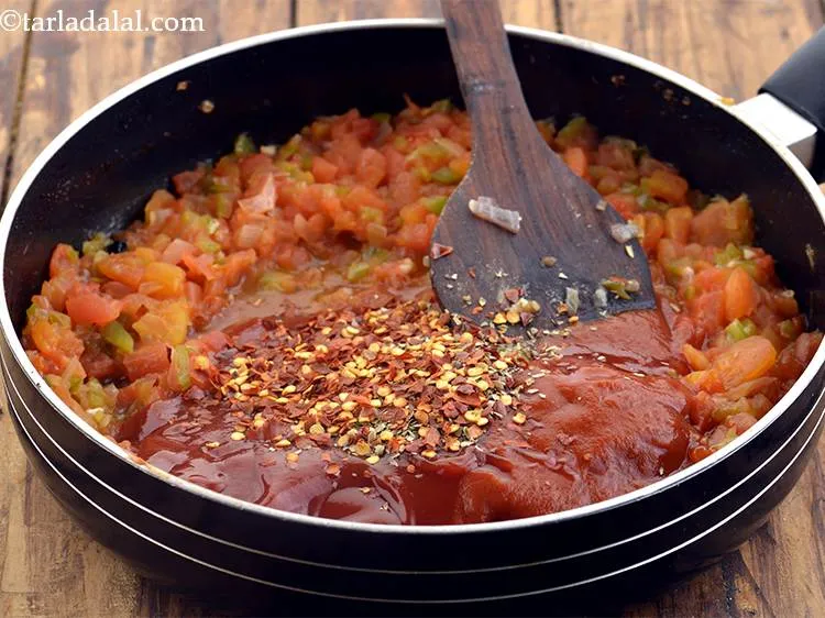 Step 36 – Add the chilli flakes for spice.