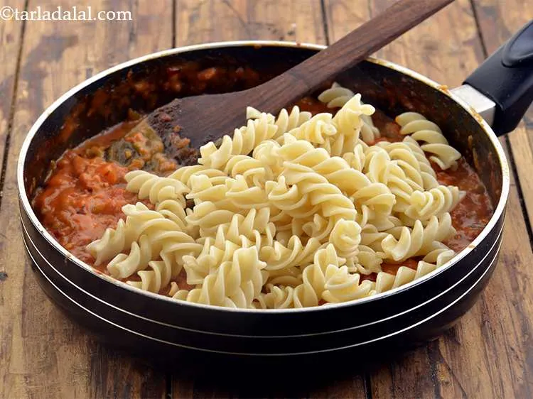 Step 40 – Add the fusilli to this sauce.