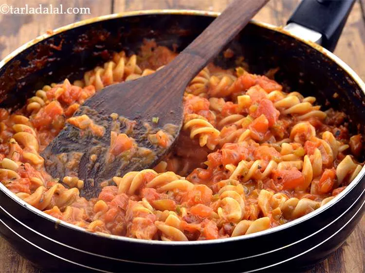 Step 41 – Toss gently and cook&nbsp;<strong>red sauce pasta | pasta in red sauce | Indian style red …