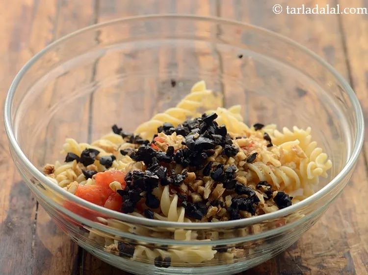 Step 10 – Add black olives.