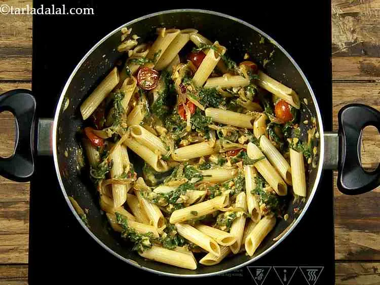 Step 13 – Mix this well and cook on a medium flame for 2 minutes, while stirring occasionally …