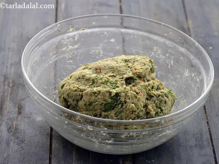 Step 15 – Gradually add approx. 5 tbsp of water and knead into a semi-soft&nbsp;<strong>Paushtic Paratha</strong>&nbsp;dough.