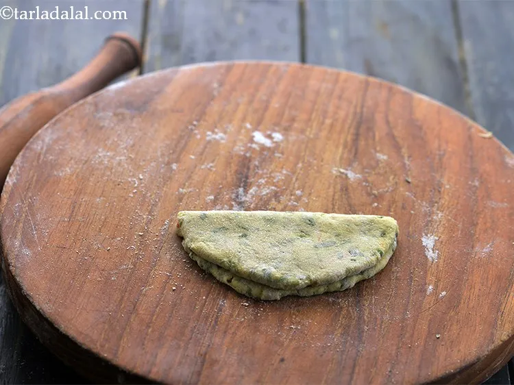 Step 19 – Fold into half to make a semi-circle.