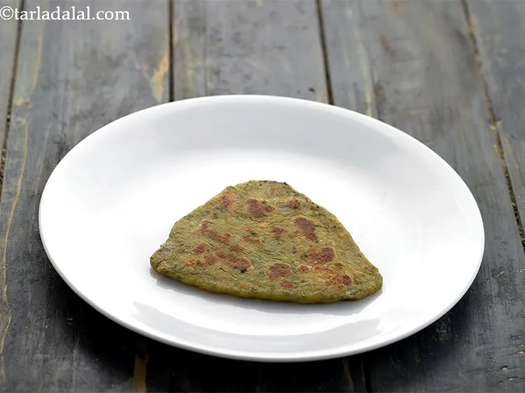 Step 25 – Remove the <strong>paushtic paratha</strong> in a plate.