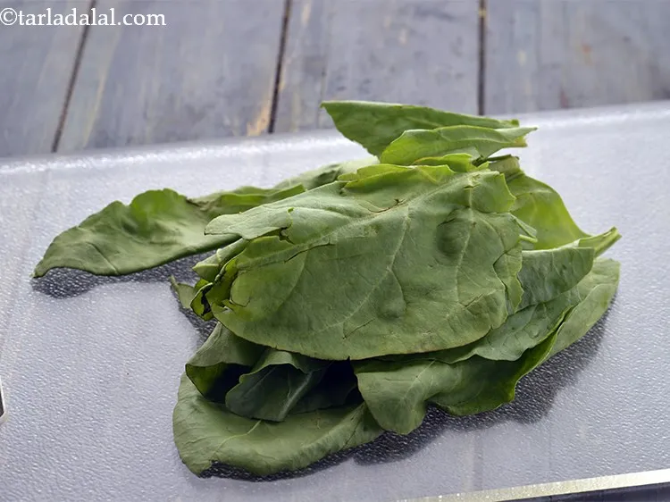 Step 3 – Remove the thick stem and discard it. Separate the fresh, green leaves aside.