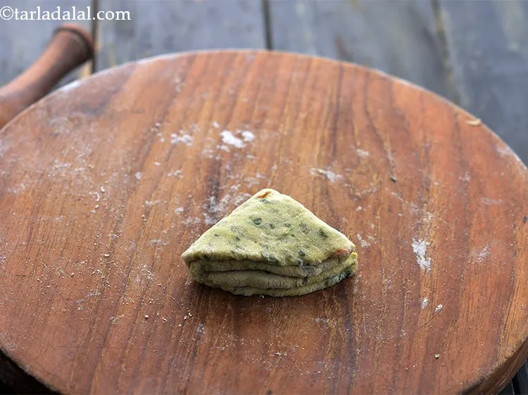 Step 20 – Fold into again to make a small triangle.