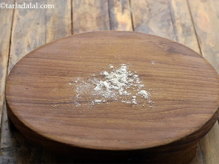 Step 13 – Put a little flour on the rolling board.