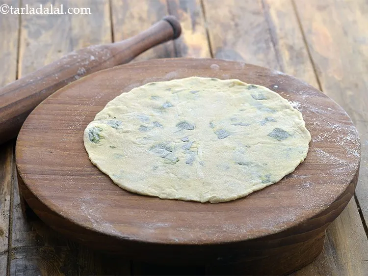 Step 15 – Roll out a portion of the dough into a 175 mm. (7&rdquo;) diameter circle with …