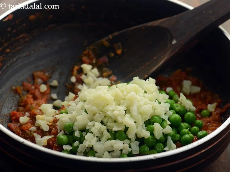 Step 17 – Add cauliflower. You can pressure cook all the vegetables or cook them in a pan.