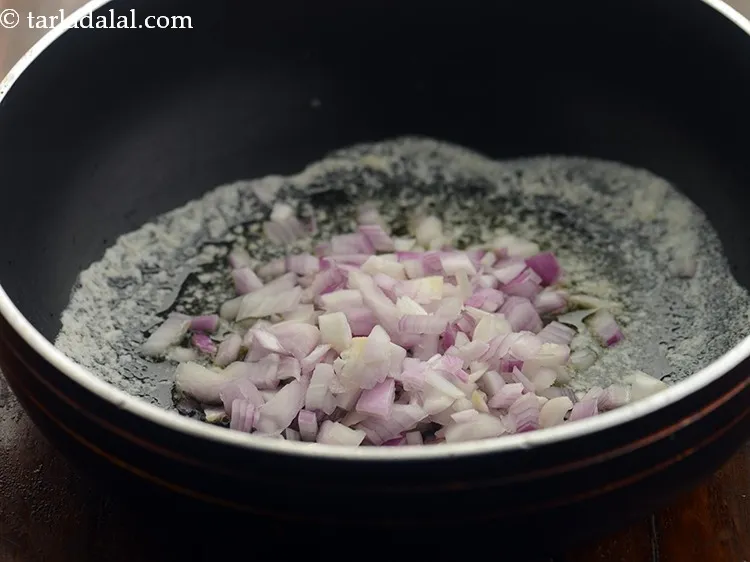 Step 3 – When the butter is hot and melts, add the onions.