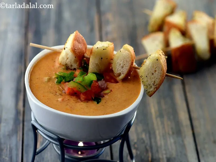 स्टेप 21 – आंच बंद कर दें और फोंड्यू स्टैंड पर टी लाइट …