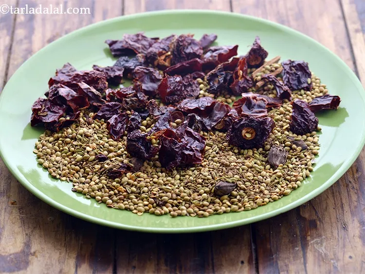 Step 10 – Remove everything in a plate and keep aside to cool completely. If you grind the …