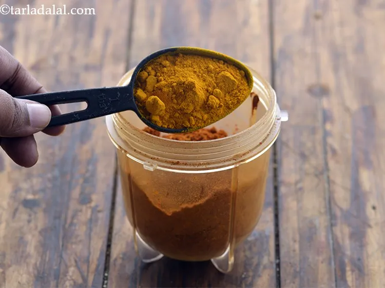 Step 12 – Add turmeric powder. Haldi is optional and can be skipped.