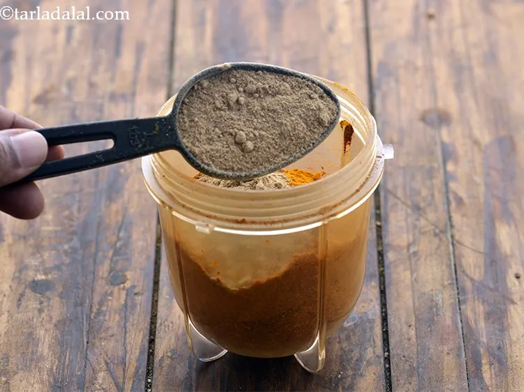 Step 13 – Add <a href="https://www.tarladalal.com/Dry-Mango-Powder-Amchur-Powder-33384r" target="_blank">dried mango powder</a>. You can use homemade.