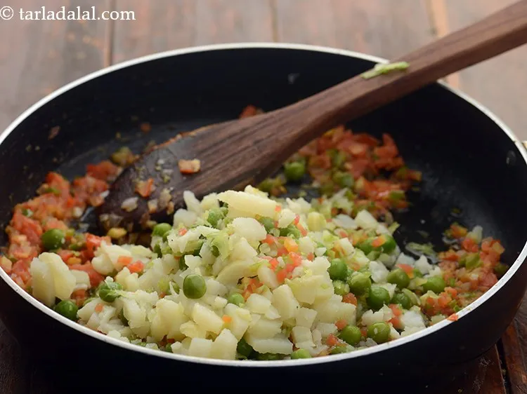 Step 11 – Add mixed vegetables. We have used potatoes, cabbage, carrot, green peas, and cauliflower. You may …