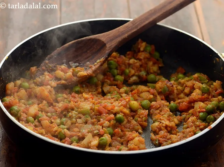 Step 12 – Add salt and &frac14; cup of water. Mix well and cook on a medium flame …