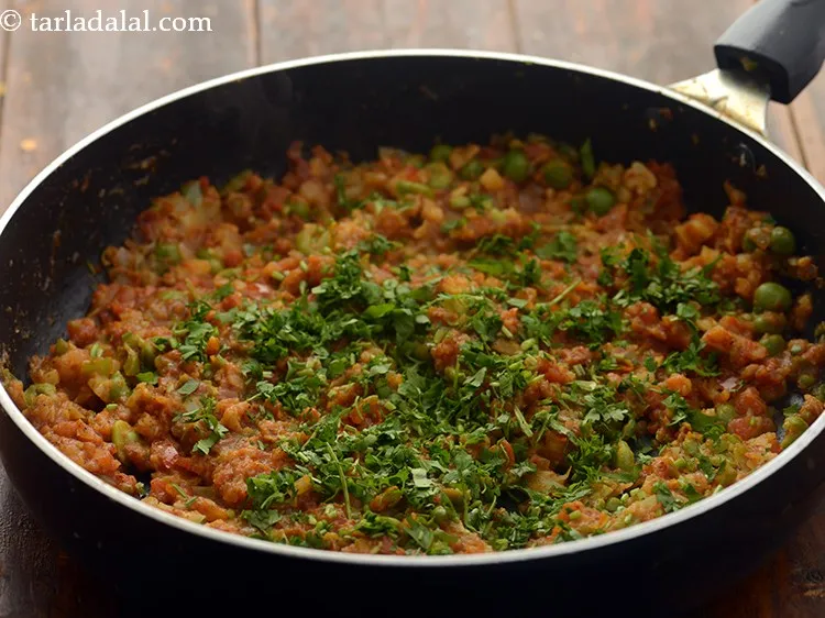 Step 14 – Add the coriander.